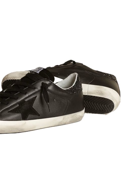 golden goose Super-Star Donna in nappa nera con stella in suede nero e talloncino in glitter neri Golden Goose | GWF00101F00346390100